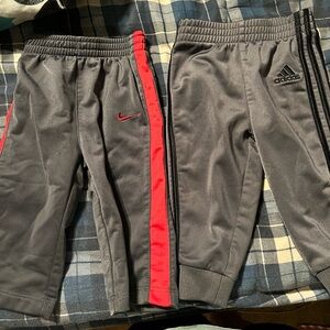 Boy Nike and Adidas pants. Nike are 6/9 months. Adidas 9 months.